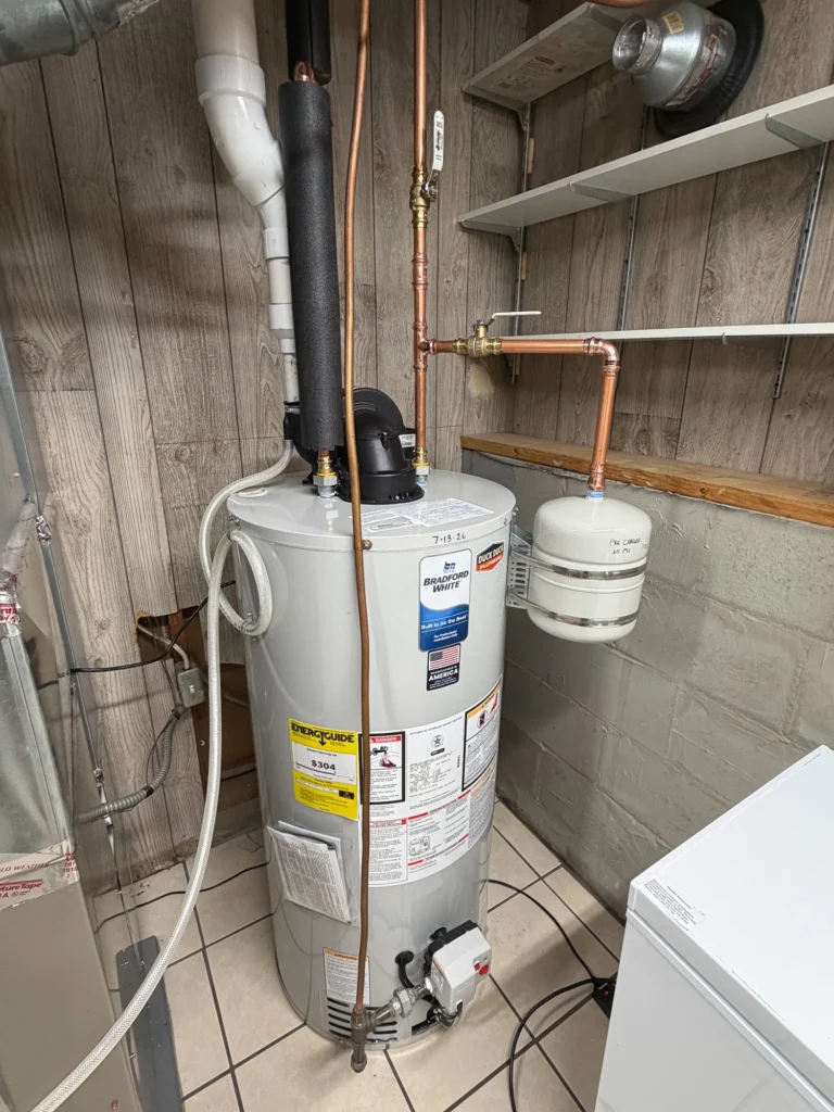 Water heater + expansion tank by Duck Duck Plumbing